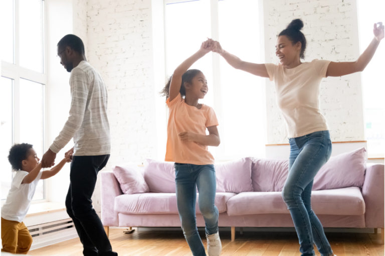Shows family dancing to fun play list